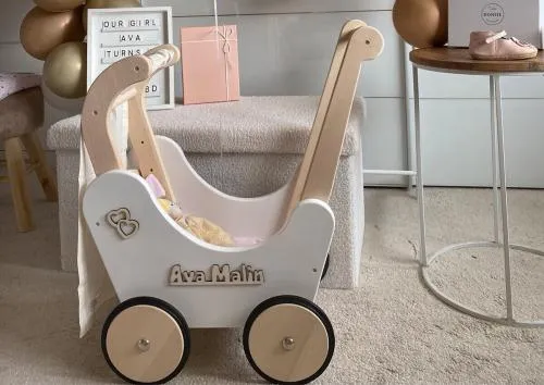 Puppenwagen rosa aus Holz - Als Geburtstagsgeschenk